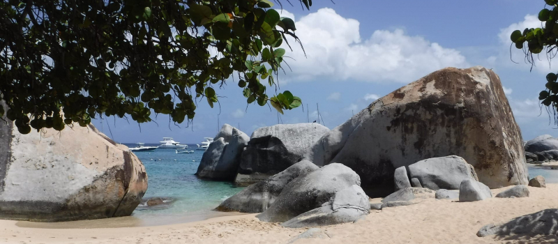 rocks and clear water on a bvi sailing itinerary