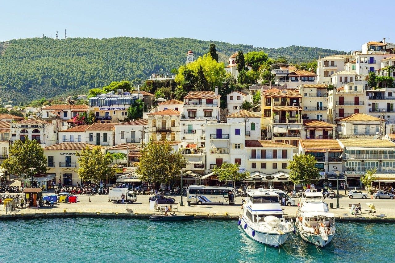colourful. houses and boats moored in the Sporades