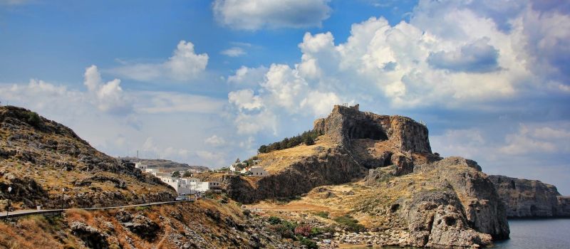 dodecanese-sailing-itinerary mountains and white houses on a Dodecanese sailing itinerary